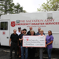 Salvation Army accepting their check